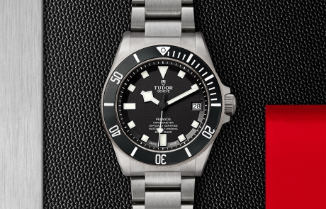 TUDOR PELAGOS displayed in a flat lay view emphasizing its design and craftsmanship.