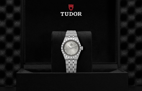 TUDOR TUDOR ROYAL nestled in its presentation box, symbolizing the watch's premium status.
