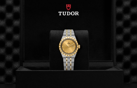 TUDOR TUDOR ROYAL nestled in its presentation box, symbolizing the watch's premium status.