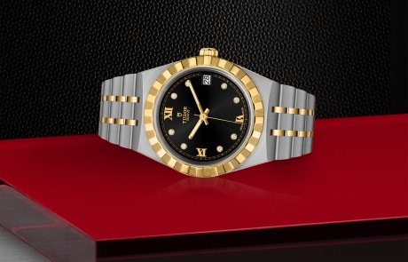 TUDOR TUDOR ROYAL laid down showcasing the black, sunray-finish, with diamonds dial and overall elegance.