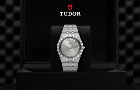 TUDOR TUDOR ROYAL nestled in its presentation box, symbolizing the watch's premium status.