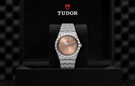 TUDOR TUDOR ROYAL nestled in its presentation box, symbolizing the watch's premium status.