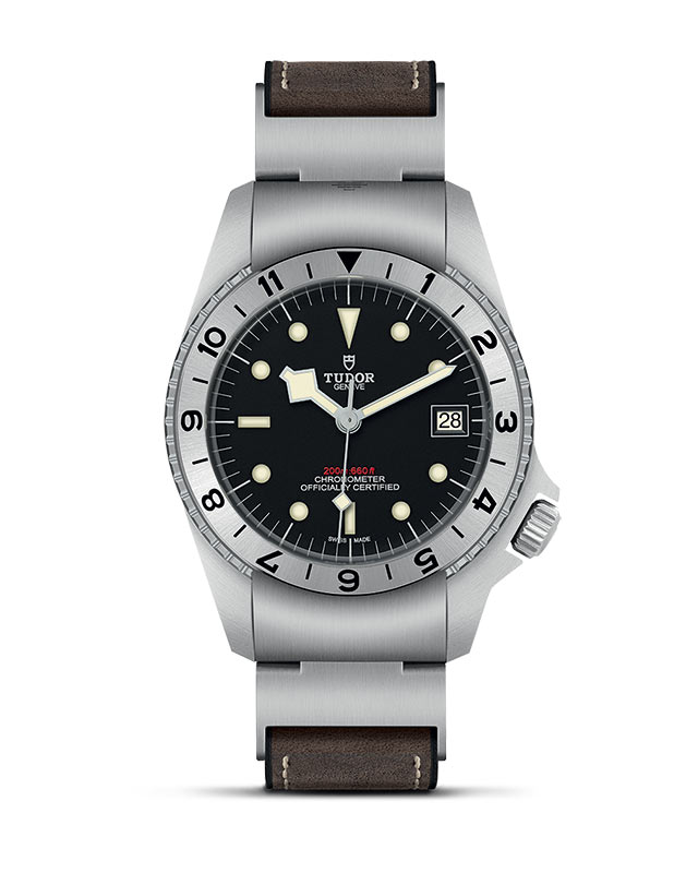 TUDOR BLACK BAY P01 presented upright against a white grid, focusing on its refined aesthetics.