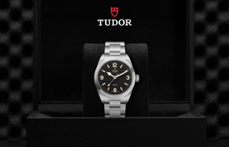 TUDOR RANGER nestled in its presentation box, symbolizing the watch's premium status.