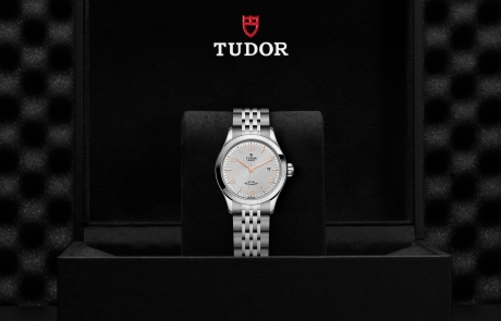 TUDOR 1926 nestled in its presentation box, symbolizing the watch's premium status.