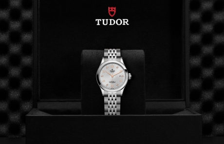 TUDOR 1926 nestled in its presentation box, symbolizing the watch's premium status.