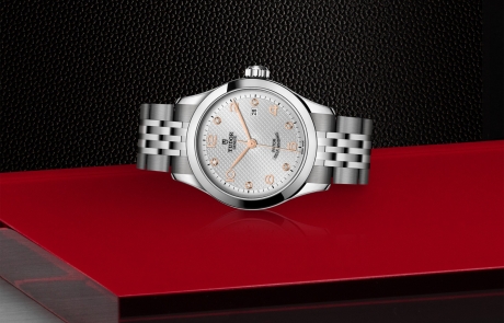 TUDOR 1926 laid down showcasing the silver, embossed decoration, domed, with 6 diamonds dial and overall elegance.