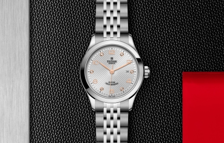TUDOR 1926 displayed in a flat lay view emphasizing its design and craftsmanship.