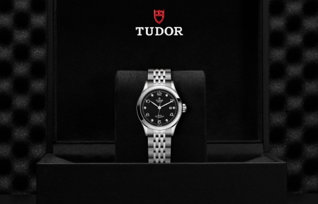 TUDOR 1926 nestled in its presentation box, symbolizing the watch's premium status.