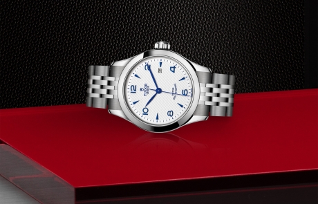TUDOR 1926 laid down showcasing the opaline, embossed decoration, domed dial and overall elegance.