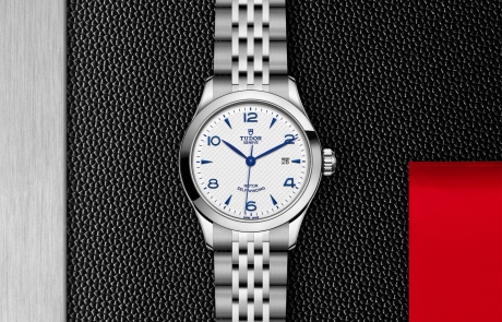 TUDOR 1926 displayed in a flat lay view emphasizing its design and craftsmanship.