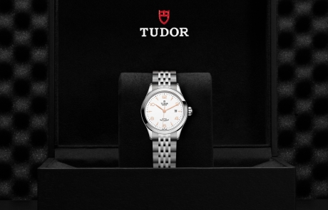 TUDOR 1926 nestled in its presentation box, symbolizing the watch's premium status.