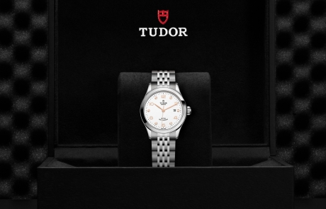 TUDOR 1926 nestled in its presentation box, symbolizing the watch's premium status.