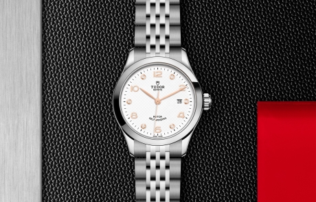TUDOR 1926 displayed in a flat lay view emphasizing its design and craftsmanship.