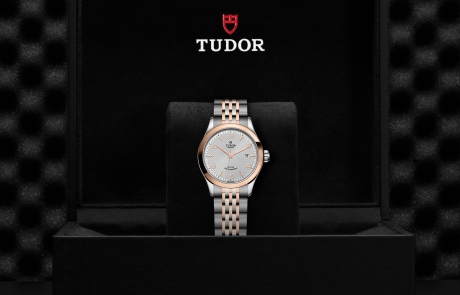 TUDOR 1926 nestled in its presentation box, symbolizing the watch's premium status.
