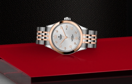 TUDOR 1926 laid down showcasing the silver, embossed decoration, domed, with 6 diamonds dial and overall elegance.