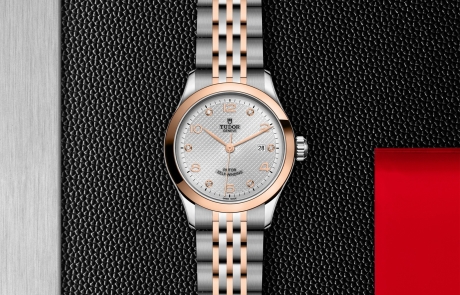 TUDOR 1926 displayed in a flat lay view emphasizing its design and craftsmanship.