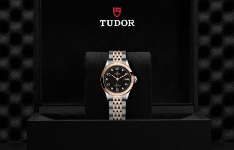 TUDOR 1926 nestled in its presentation box, symbolizing the watch's premium status.