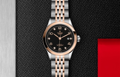 TUDOR 1926 displayed in a flat lay view emphasizing its design and craftsmanship.