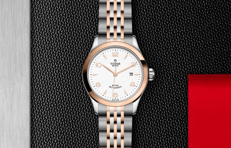 TUDOR 1926 displayed in a flat lay view emphasizing its design and craftsmanship.