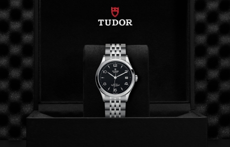 TUDOR 1926 nestled in its presentation box, symbolizing the watch's premium status.