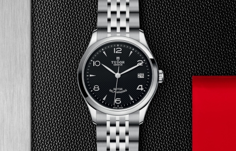 TUDOR 1926 displayed in a flat lay view emphasizing its design and craftsmanship.