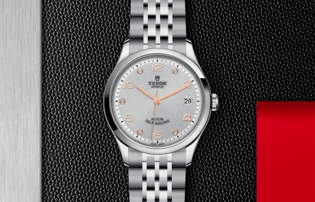 TUDOR 1926 displayed in a flat lay view emphasizing its design and craftsmanship.