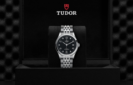 TUDOR 1926 nestled in its presentation box, symbolizing the watch's premium status.