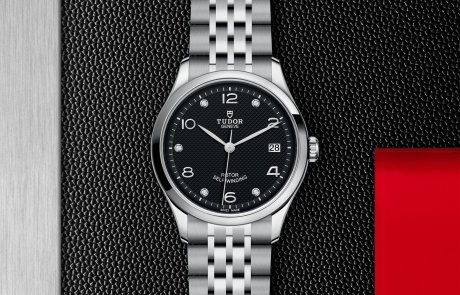 TUDOR 1926 displayed in a flat lay view emphasizing its design and craftsmanship.