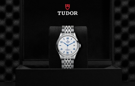 TUDOR 1926 nestled in its presentation box, symbolizing the watch's premium status.
