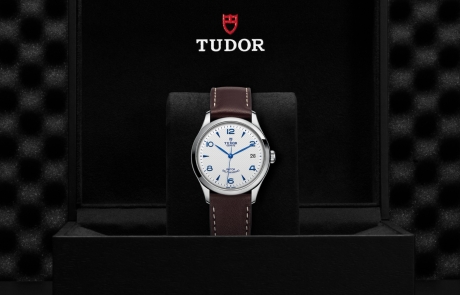 TUDOR 1926 nestled in its presentation box, symbolizing the watch's premium status.
