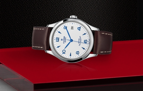 TUDOR 1926 laid down showcasing the opaline, embossed decoration, domed dial and overall elegance.