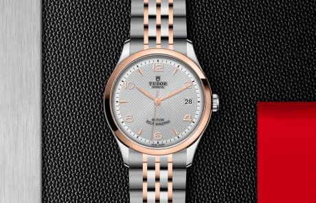 TUDOR 1926 displayed in a flat lay view emphasizing its design and craftsmanship.