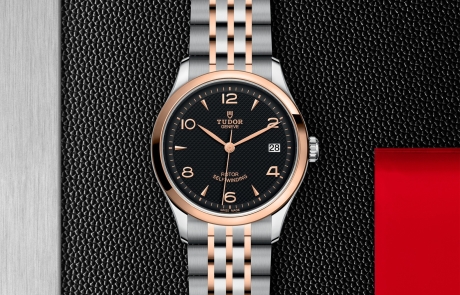 TUDOR 1926 displayed in a flat lay view emphasizing its design and craftsmanship.