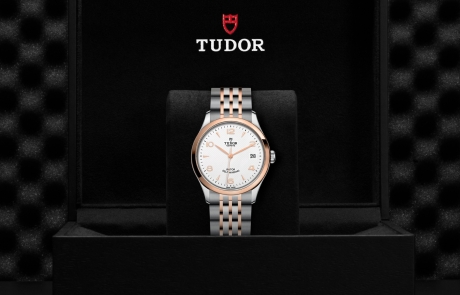 TUDOR 1926 nestled in its presentation box, symbolizing the watch's premium status.
