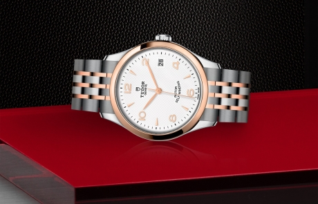 TUDOR 1926 laid down showcasing the white, embossed decoration, domed dial and overall elegance.