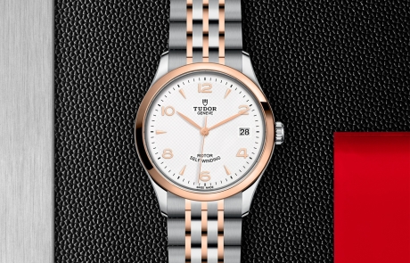 TUDOR 1926 displayed in a flat lay view emphasizing its design and craftsmanship.