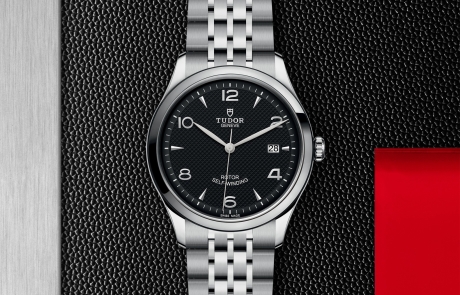 TUDOR 1926 displayed in a flat lay view emphasizing its design and craftsmanship.