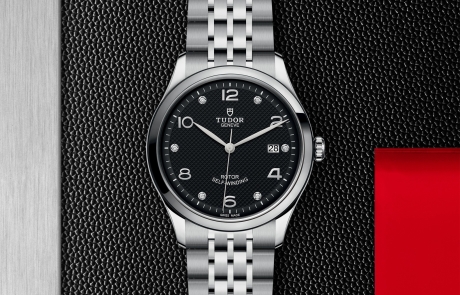 TUDOR 1926 displayed in a flat lay view emphasizing its design and craftsmanship.