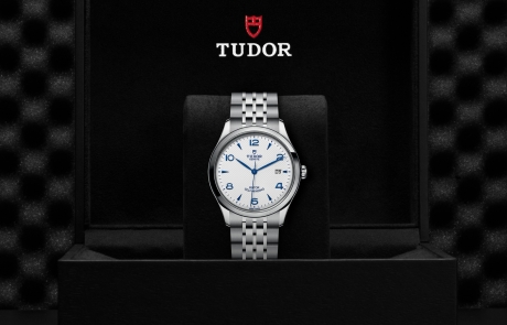TUDOR 1926 nestled in its presentation box, symbolizing the watch's premium status.