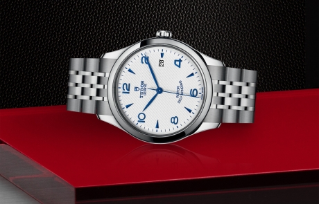 TUDOR 1926 laid down showcasing the opaline, embossed decoration, domed dial and overall elegance.