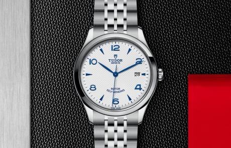 TUDOR 1926 displayed in a flat lay view emphasizing its design and craftsmanship.