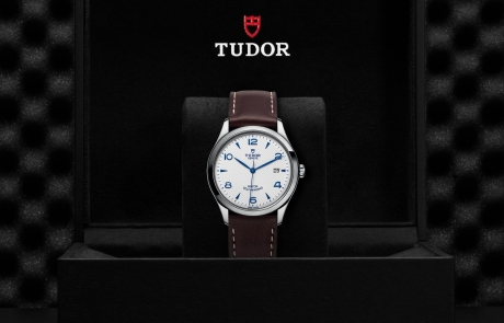 TUDOR 1926 nestled in its presentation box, symbolizing the watch's premium status.