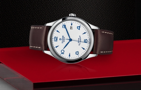 TUDOR 1926 laid down showcasing the opaline, embossed decoration, domed dial and overall elegance.