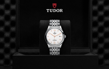 TUDOR 1926 nestled in its presentation box, symbolizing the watch's premium status.