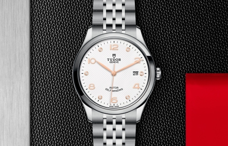 TUDOR 1926 displayed in a flat lay view emphasizing its design and craftsmanship.