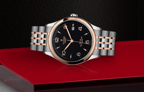 TUDOR 1926 laid down showcasing the black, embossed decoration, domed dial and overall elegance.