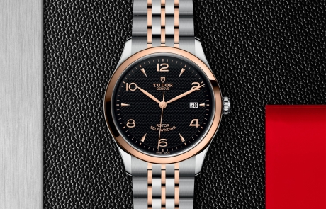 TUDOR 1926 displayed in a flat lay view emphasizing its design and craftsmanship.