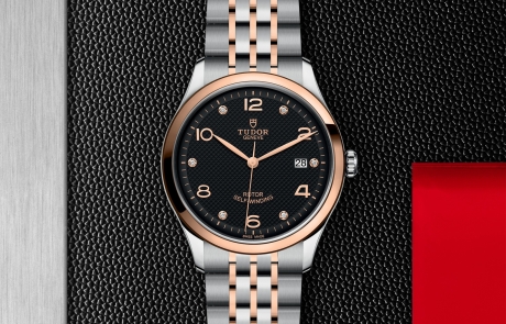 TUDOR 1926 displayed in a flat lay view emphasizing its design and craftsmanship.