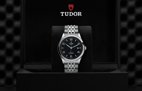 TUDOR 1926 nestled in its presentation box, symbolizing the watch's premium status.